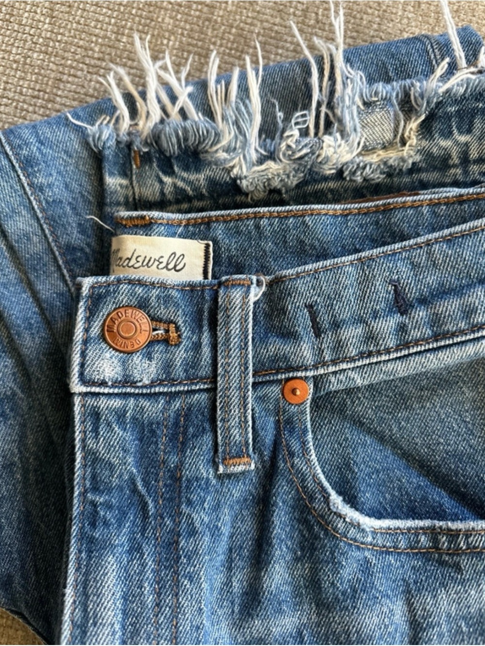Madewell Distressed High-Rise Light Blue Denim Jeans
